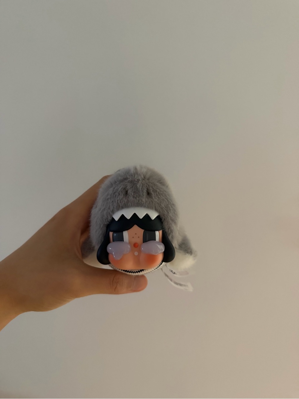Gray Plush Character Keychain Figure with Cute Face